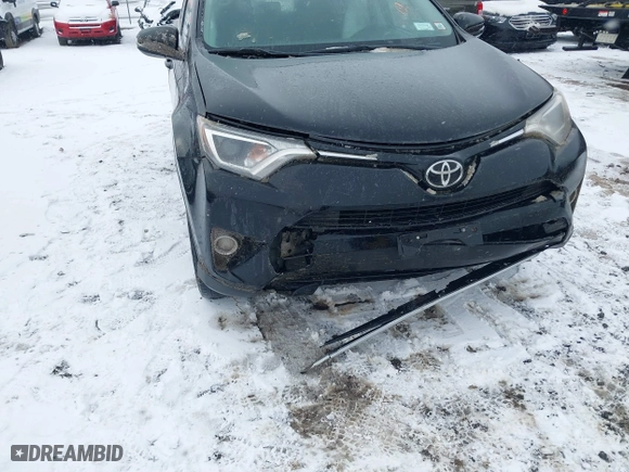 2018 Toyota RAV4 XLE with VIN 2T3RFREV8JW851250, listed as a IAAI auction lot 41164994 with 63,005 mi miles. Bid and sale history available at carsss.com. Image 6.