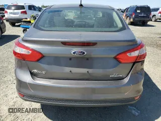 2013 Ford Focus SE z VIN 1FADP3F23DL296908, wystawiony jako Copart lot #57076095 z przebiegiem 160 690 mil mil oraz Szkoda całkowita • Salvage title. Historia ofert i sprzedaży dostępna na DreamBid. Obrazek 6.