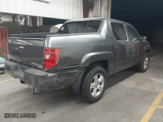2011 Honda Ridgeline RTL with VIN 5FPYK1F57BB004189, listed as a IAAI auction lot 41871741 with 193,913 mi miles. Bid and sale history available at carsss.com. Image 4.