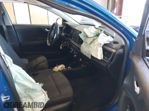 2021 Kia Rio S with VIN 3KPA24AD7ME364789, listed as a IAAI auction lot 42044676 with 54,072 mi miles and . Bid and sale history available at DreamBid. Image 5.
