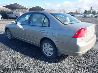 2003 Honda Civic EX with VIN 2HGES26793H548855, listed as a IAAI auction lot 41777707 with 169,783 mi miles. Bid and sale history available at carsss.com. Image 3.