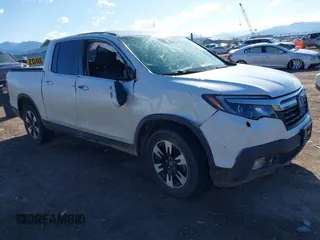 2020 Honda Ridgeline RTL with VIN 5FPYK3F50LB028430, listed as a IAAI auction lot 42033090 with Not provided miles and . Bid and sale history available at DreamBid. Image 1.