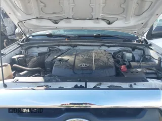 2014 Toyota Tacoma PreRunner with VIN 3TMJU4GN7EM158230, listed as a IAAI auction lot 40010521 with 145,185 mi miles. Bid and sale history available at carsss.com. Image 10.