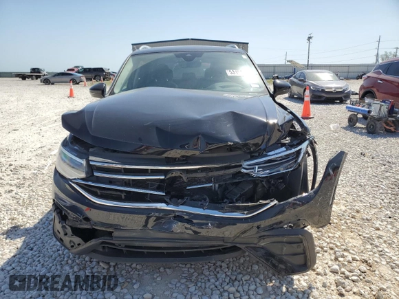 2022 Volkswagen Tiguan SE с VIN 3VV3B7AX8NM121859, выставлен на аукционе Copart как лот 53193415 с пробегом 24 559 миль миль и Списание • Salvage title. История ставок и продаж доступна на DreamBid. Изображение 5.