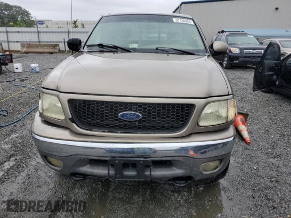 2002 Ford F-150 XL with VIN 1FTRX18L02NA58574, listed as a Copart auction lot 57156255 with 291,950 mi miles and Salvage title. Bid and sale history available at DreamBid. Image 5.