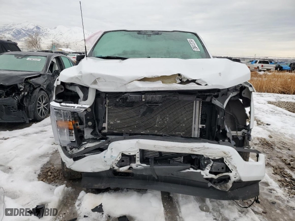2022 Ford F-150 XL with VIN 1FTFW1E88NKF05082, listed as a Copart auction lot 38413734 with 23,469 mi miles and Salvage Title. Bid and sale history available at carsss.com. Image 5.