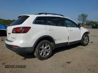 2015 Mazda CX-9 Touring z VIN JM3TB2CA7F0467259, wystawiony jako Copart lot #55646055 z przebiegiem Nie podano mil oraz Czysty tytuł • Clean title. Historia ofert i sprzedaży dostępna na DreamBid. Obrazek 3.