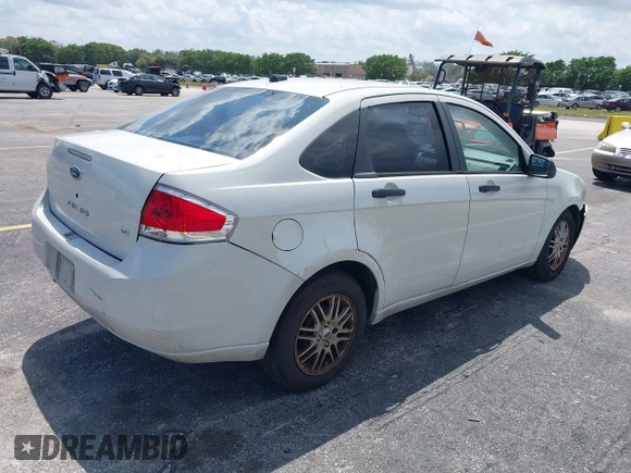 2009 Ford Focus SE with VIN 1FAHP35N49W144218, listed as a IAAI auction lot 41966945 with 207,224 mi miles. Bid and sale history available at carsss.com. Image 4.