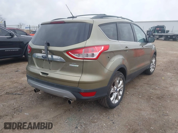2013 Ford Escape SEL with VIN 1FMCU0HX9DUC77808, listed as a IAAI auction lot 41967998 with 71,196 mi miles. Bid and sale history available at carsss.com. Image 4.