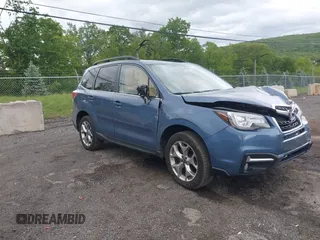 2018 Subaru Forester Touring with VIN JF2SJAWC5JH528330, listed as a IAAI auction lot 42344618 with 62,446 mi miles and . Bid and sale history available at DreamBid. Image 1.