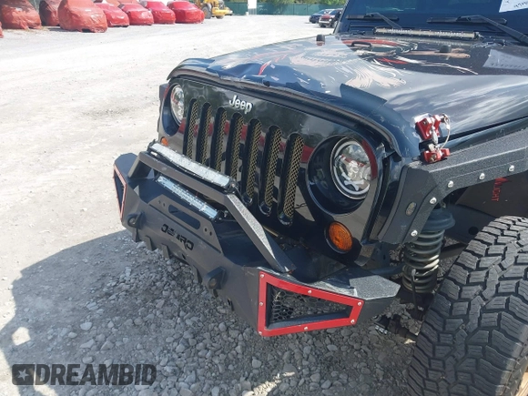 2012 Jeep Wrangler Sport z VIN 1C4AJWAG2CL286680, wystawiony jako IAAI lot #42434411 z przebiegiem 97 142 mil mil oraz . Historia ofert i sprzedaży dostępna na DreamBid. Obrazek 6.