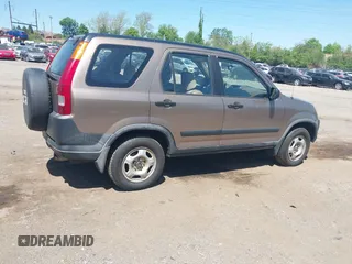 2004 Honda CR-V LX with VIN JHLRD68444C015503, listed as a IAAI auction lot 42145422 with 189,975 mi miles and . Bid and sale history available at carsss.com. Image 4.