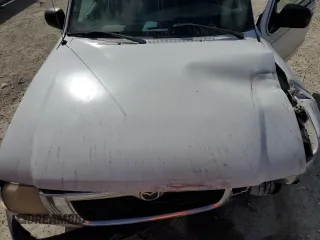2000 Mazda B-Series 2WD Truck DS with VIN 4F4YR16VXYTM31299, listed as a Copart auction lot 44144695 with 123,283 mi miles and Salvage Title. Bid and sale history available at carsss.com. Image 11.