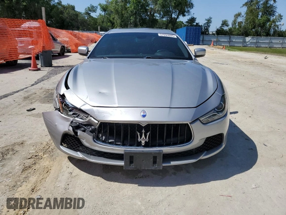 2015 Maserati Ghibli с VIN ZAM57XSA9F1154155, выставлен на аукционе Copart как лот 57093695 с пробегом 63 190 миль миль и Списание • Salvage title. История ставок и продаж доступна на DreamBid. Изображение 5.