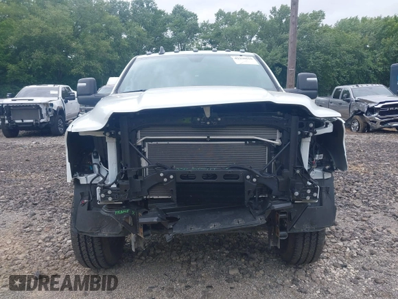 2024 Ram 2500 Tradesman with VIN 3C6UR5HJ8RG288173, listed as a IAAI auction lot 42290610 with 5,757 mi miles and . Bid and sale history available at DreamBid. Image 6.