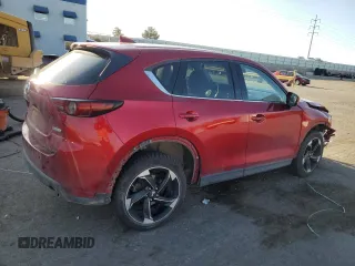 2018 Mazda CX-5 Grand Touring z VIN JM3KFBDMXJ0390680, wystawiony jako Copart lot #51654345 z przebiegiem 67 167 mil mil oraz Szkoda całkowita • Salvage title. Historia ofert i sprzedaży dostępna na DreamBid. Obrazek 3.