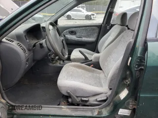 1998 Mitsubishi Mirage DE z VIN JA3AY26A2WU042095, wystawiony jako Copart lot #84700394 z przebiegiem 124 362 mil mil oraz Czysty tytuł • Clean title. Historia ofert i sprzedaży dostępna na DreamBid. Obrazek 7.