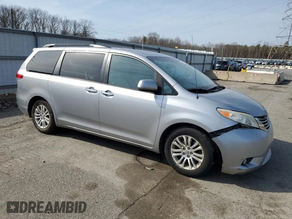 2012 Toyota Sienna XLE AAS with VIN 5TDYK3DCXCS235414, listed as a Copart auction lot 48776245 with 149,658 mi miles and Salvage Title. Bid and sale history available at carsss.com. Image 4.