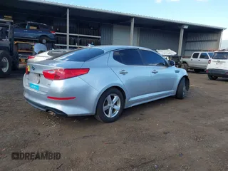 2015 Kia Optima LX z VIN 5XXGM4A74FG476636, wystawiony jako IAAI lot #41242478 z przebiegiem Nie podano mil oraz . Historia ofert i sprzedaży dostępna na DreamBid. Obrazek 4.