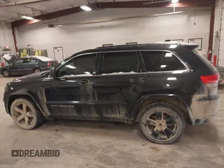 2015 Jeep Grand Cherokee Laredo with VIN 1C4RJFAG3FC607827, listed as a IAAI auction lot 41298397 with 198,171 mi miles. Bid and sale history available at carsss.com. Image 14.