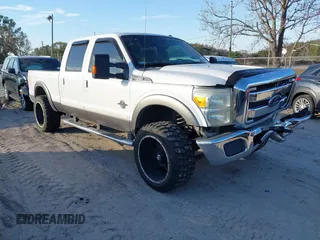 2014 Ford Super Duty F-250 SRW XL with VIN 1FT7W2BT4EEB32396, listed as a IAAI auction lot 41229390 with 196,303 mi miles. Bid and sale history available at carsss.com. Image 1.