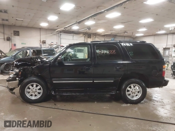 2004 Chevrolet Tahoe Z71 with VIN 1GNEK13T64R100267, listed as a IAAI auction lot 41544388 with 212,525 mi miles and . Bid and sale history available at DreamBid. Image 14.