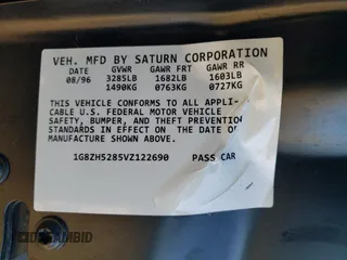 1997 Saturn SL z VIN 1G8ZH5285VZ122690, wystawiony jako Copart lot #81655244 z przebiegiem 159 048 mil mil oraz Szkoda całkowita • Salvage title. Historia ofert i sprzedaży dostępna na DreamBid. Obrazek 14.