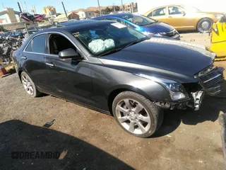 2015 Cadillac ATS Sedan Luxury RWD with VIN 1G6AB5RX5F0101834, listed as a IAAI auction lot 37302564 with 107,046 mi miles. Bid and sale history available at carsss.com. Image 1.