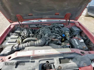 2001 Ford Explorer Sport Trac z VIN 1FMZU67E71UC07927, wystawiony jako Copart lot #58434195 z przebiegiem 189 057 mil mil oraz Szkoda całkowita • Salvage title. Historia ofert i sprzedaży dostępna na DreamBid. Obrazek 11.