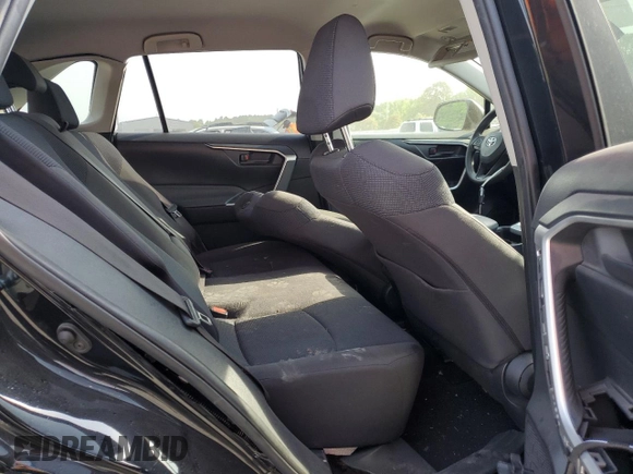2019 Toyota RAV4 LE with VIN JTMH1RFV8KD039728, listed as a Copart auction lot 59669035 with 100,355 mi miles and Salvage title. Bid and sale history available at DreamBid. Image 11.