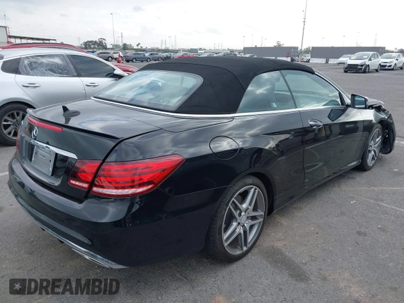 2016 Mercedes-Benz E E 400 with VIN WDDKK6FF7GF339417, listed as a IAAI auction lot 42111352 with 59,859 mi miles. Bid and sale history available at carsss.com. Image 4.