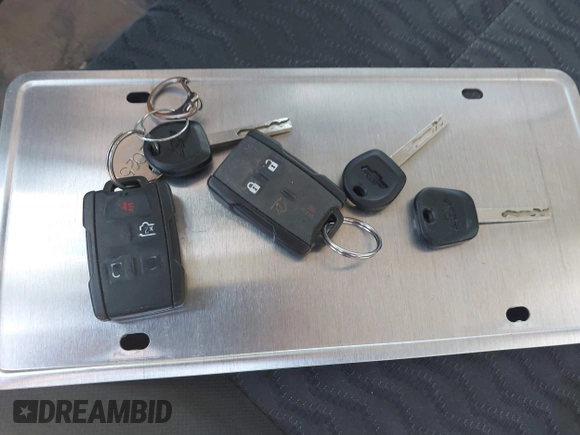 2019 Chevrolet Tahoe Commercial z VIN 1GNLCDEC4KR295348, wystawiony jako IAAI lot #41225134 z przebiegiem Nie podano mil oraz . Historia ofert i sprzedaży dostępna na DreamBid. Obrazek 11.