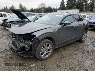 2024 Mazda CX-30 2.5 S Premium Package with VIN 3MVDMBDMXRM716850, listed as a Copart auction lot 87770035 with 3,497 mi miles and Salvage Title. Bid and sale history available at carsss.com. Image 1.