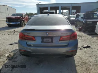 2018 BMW 5 Series M550i xDrive with VIN WBAJB9C53JB034947, listed as a Copart auction lot 77270534 with Not provided miles and Non repairable. Bid and sale history available at DreamBid. Image 6.