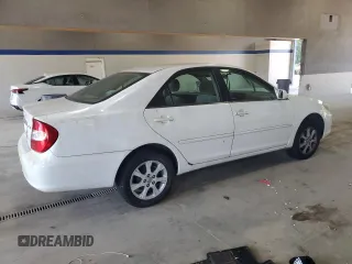 2004 Toyota Camry LE with VIN JTDBE32K940245895, listed as a Copart auction lot 63064585 with 197,467 mi miles and Clean title. Bid and sale history available at DreamBid. Image 3.
