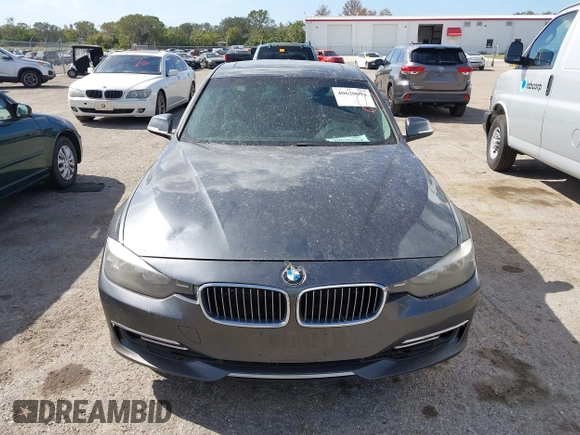 2013 BMW 3 Series 328i xDrive with VIN WBA3B3G56DNR81144, listed as a IAAI auction lot 40620694 with 159,022 mi miles. Bid and sale history available at carsss.com. Image 12.