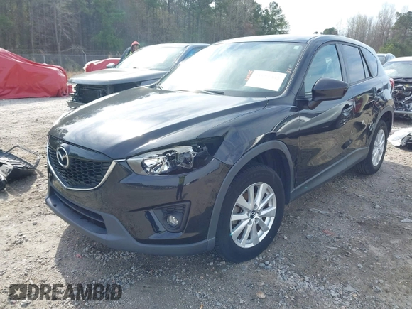2014 Mazda CX-5 Touring with VIN JM3KE2CY9E0333951, listed as a IAAI auction lot 41825345 with 124,684 mi miles. Bid and sale history available at carsss.com. Image 18.