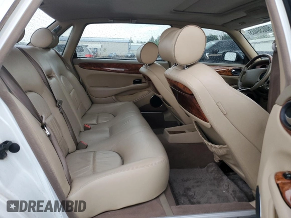 1999 Jaguar XJ with VIN SAJKD6041XC876928, listed as a Copart auction lot 60038405 with 63,917 mi miles and Clean title. Bid and sale history available at DreamBid. Image 10.