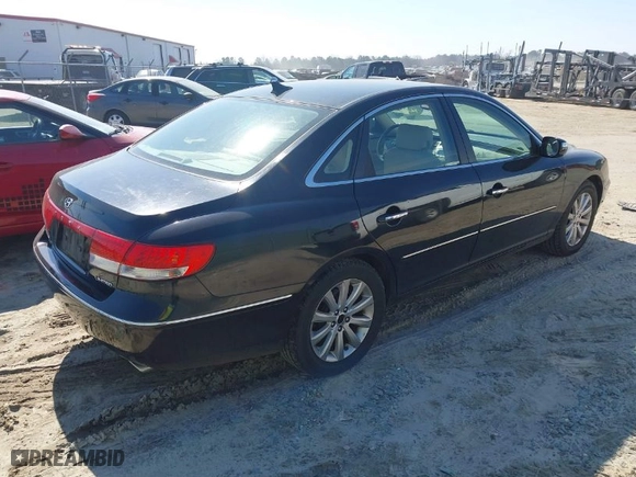 2010 Hyundai Azera Limited with VIN KMHFC4DF2AA459660, listed as a IAAI auction lot 41673001 with 177,060 mi miles. Bid and sale history available at carsss.com. Image 4.
