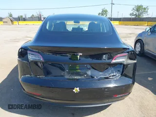 2018 Tesla Model 3 Long Range Battery with VIN 5YJ3E1EA7JF057031, listed as a IAAI auction lot 42139832 with 92,618 mi miles and . Bid and sale history available at DreamBid. Image 15.