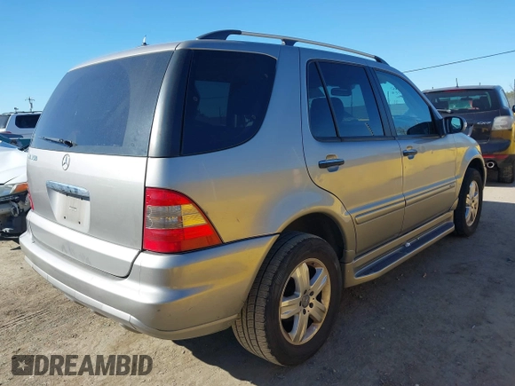 2005 Mercedes-Benz M 350 with VIN 4JGAB57E65A550801, listed as a IAAI auction lot 41669539 with 207,572 mi miles and . Bid and sale history available at DreamBid. Image 4.