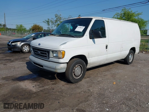 1999 Ford Econoline Cargo with VIN 1FTRE1420XHA34056, listed as a IAAI auction lot 41998411 with 236,267 mi miles. Bid and sale history available at carsss.com. Image 17.