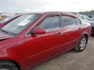 2008 Kia Optima LX with VIN KNAGE123885257626, listed as a IAAI auction lot 42072433 with 106,572 mi miles. Bid and sale history available at carsss.com. Image 14.