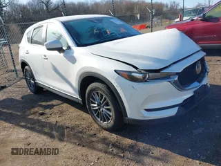 2017 Mazda CX-5 Touring with VIN JM3KFBCL4H0125501, listed as a IAAI auction lot 41979179 with 109,926 mi miles. Bid and sale history available at carsss.com. Image 1.