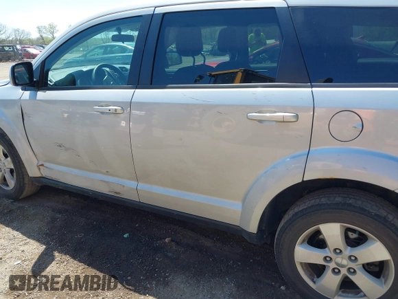 2011 Dodge Journey Mainstreet with VIN 3D4PH1FG4BT562414, listed as a IAAI auction lot 42122747 with 132,488 mi miles and . Bid and sale history available at DreamBid. Image 13.