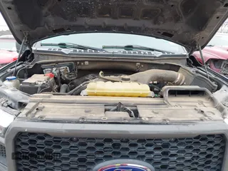 2020 Ford F-150 XL with VIN 1FTEW1CP5LFB54076, listed as a IAAI auction lot 42399310 with 68,535 mi miles and . Bid and sale history available at DreamBid. Image 10.