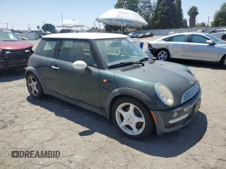 2002 MINI Hardtop with VIN WMWRC33442TC35176, listed as a Copart auction lot 65486135 with 58,504 mi miles and Clean title. Bid and sale history available at DreamBid. Image 4.