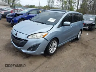 2012 Mazda 5 Grand Touring with VIN JM1CW2DL4C0141511, listed as a IAAI auction lot 42001392 with 99,097 mi miles and . Bid and sale history available at carsss.com. Image 17.