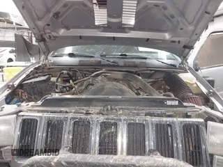 1998 Jeep Grand Cherokee Laredo with VIN 1J4GZ48Y9WC206957, listed as a IAAI auction lot 41848433 with 122,104 mi miles. Bid and sale history available at carsss.com. Image 10.