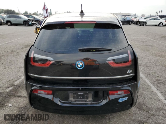 2020 BMW i3 z VIN WBY8P4C08L7G74380, wystawiony jako Copart lot #40858024 z przebiegiem 34 379 mil mil oraz . Historia ofert i sprzedaży dostępna na DreamBid. Obrazek 6.